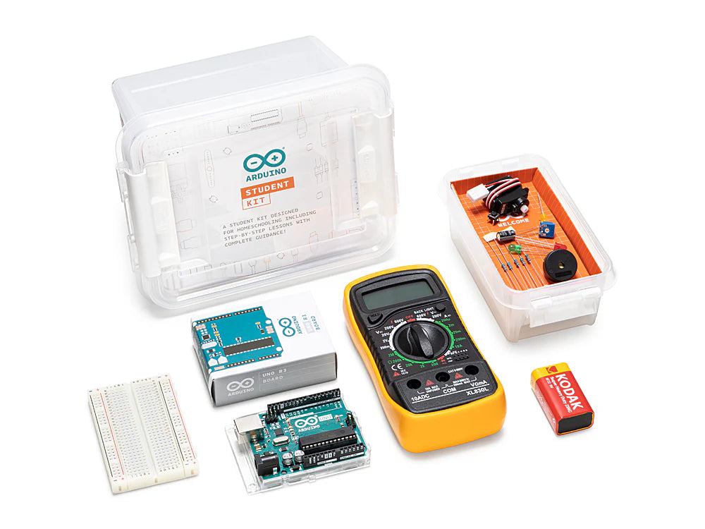 Electronics components including a multimeter, breadboard, and Arduino parts on a white background